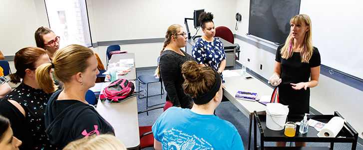 Psychology professor demonstrating class project